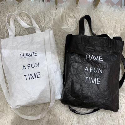 China Simple fashion packaging tyvek paper dupont paper letter design washable waterproof cross shoulder handbag for sale