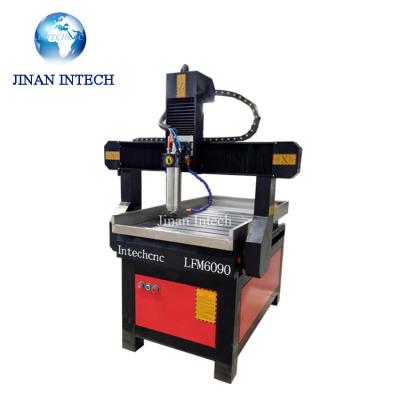 China Home Use 6090 Universal 4 Axis CNC Router CNC Engraving Machine in Lahore Pakistan for sale