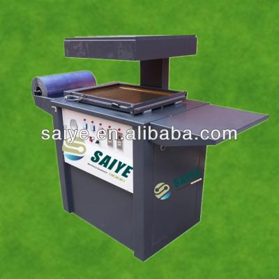 China SY-390 Automatic Products Vacuum Peel Packaging Machine for sale