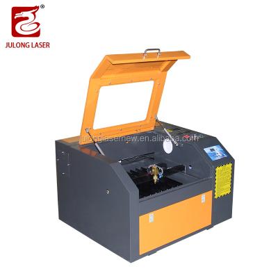 China Water Cooled Aluminum Rail 40w Portable Mobile Phone Films Laser Cutting Machine With Laser Engraving Machine for sale