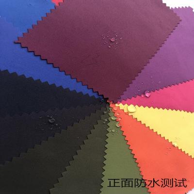 China Manufacturer Wholesale High Quality plain raincoat dyed clothing fabric with windproof and warm for outdoor school uniform fabric for sale