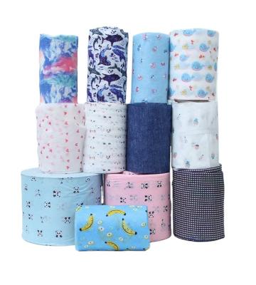 China Manufacturer Spot Wholesale Variety of Colors100% Polyester Spunlace Breathable Non Woven Fabric Custom Children's Fabric for sale