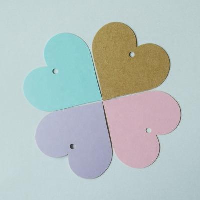 China Wholesale Recyled Wedding Favor Hollow Heart Shape Paper Gift Tags for sale