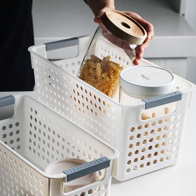 China Fashion Sustainable Design Plastic Household Desktop Cavity Storage Basket for sale