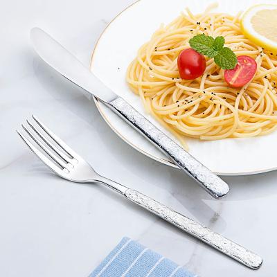 China Viable Luxury Wholesale Logo Customized Delux Special Handle Amazon Hit 18/10 Stainless Steel Flatware Cutlery Set for sale