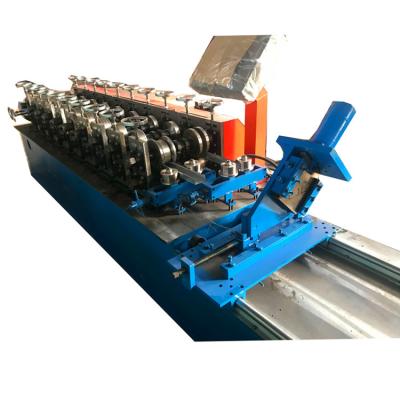 China Steel Roof Stud And Metal Track Profiles Roll Forming Machine for sale