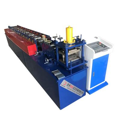 China High Production Speed ​​Galvanized Steel Metal 0.3 - 1mm Shutter Door Steel Sheet Roll Forming Machine for sale