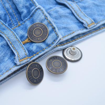 China Washable Custom Logo Fabric Custom Size Embossed Vintage Jeans Buttons for sale