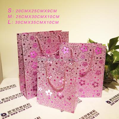 China New Luxury Wholesale Glitter Paper Bag Glitter Jewelry Gift Shopping Bag For Birthday Gift Packaging for sale