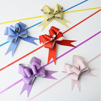 China Holographic Wholesale CPP Eco-friendly Colorful Glitter Bow Flower For Gift Packing for sale