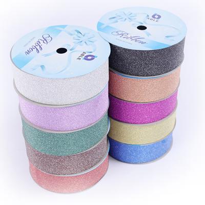 China Wholesale CPP 1.6cm x 10m Holographic Glitter Plastic Colored Plastic Ribbon for sale