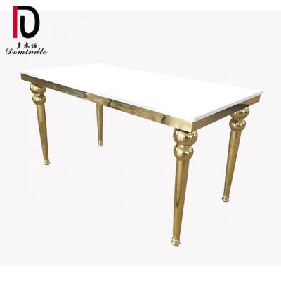 China Modern Gold Frame Stainless Steel MDF Top Wedding Banquet Table for sale