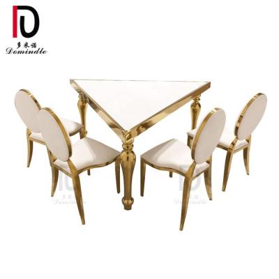 China Dubai MDF Modern Luxury Triangle Stainless Steel Frame Wedding Dining Table for sale