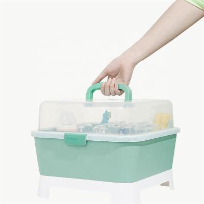 China Multi-Function Dry Plastic Bottles PP Handheld Baby Bottle Cabinet Storage Box For Kids Baby Bottle Drying Rack for sale