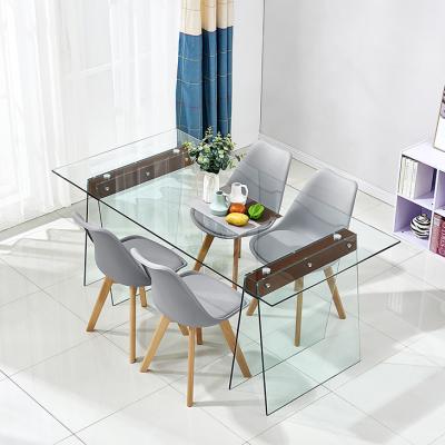 China Modern design high quality modern design long porcelain dining table modern minimalist transparent glass dining table for sale