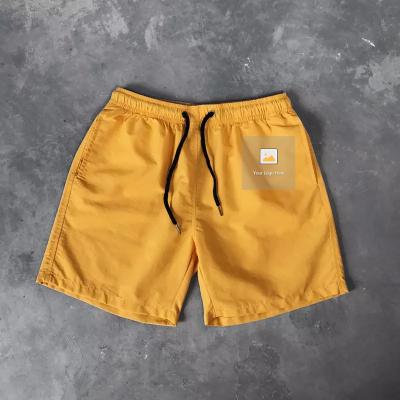 China wholesale Anti-wrinkle running beach shorts polyester men running shorts mesh striping abbreviations men with letter printing for sale