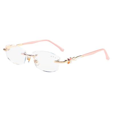 China Wholesale Thin Unisex Pink Optical Glasses Frames Metal Anti Blue Light Rimless Indicating Glass Cheap Women for sale