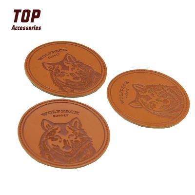 China Designer Handmade Round Leather Patches Logo Leather Patches Factory Price Custom Made for sale