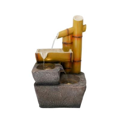 China Decorative Outdoor Feature Stone China Resin Craft Bamboo Water Fountain With Electric Pump for sale