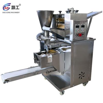 China High Effciency 110V/220V Hotels 12/15cm Automatic Large Size Empanada Machine/Sheet Dumpling Making Large Dumpling Samosa Making Machine for sale