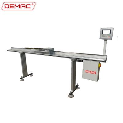 China Building Material Shops Automatic Stopper Roller Table Conveyor for sale