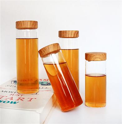 China Wholesale 180ml/280ml/360ml/500ml Round Honey Jars For Honey Water Beverage Drinking With Wooden Plastic Lids for sale