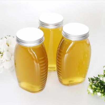 China Honey Jar Wholesale Factory Price 180ml 330ml 660ml 1 pound glass jar for Honey With Tin Lids for sale