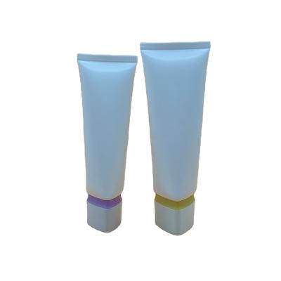 China 2022 CleanserCream makeup tube OEM ODM fashionable triangle PE plastic sunscreen empty cosmetic packaging facial 2022 tube for sale