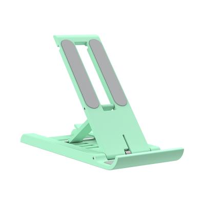 China New Arrival Adjustable ABS Mobile Phone Display Stand Promotional Plastic Holders With Customized Logo for sale