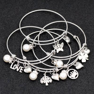 China Vintage Heart Bead Love Tree Butterfly Clover Crown Stainless Steel Retractable Bangle Bracelets for sale