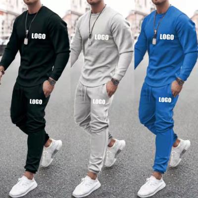 China Breathable Custom Logo Training Fitness Sports Trousers Men Two Piece Set Tracksuit For Winter for sale