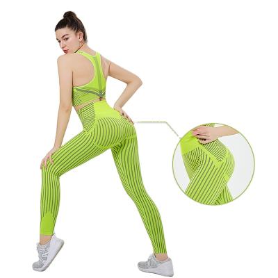 China New yoga suit breathable seamless striped yoga suit hip-lifting sports plus size tight yoga pants for sale