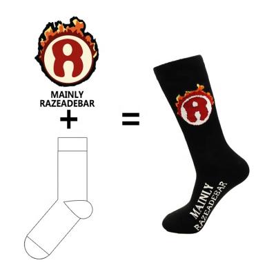 China Breathable Custom Men Branded Cotton Knitted Sports Socks Character Design Basketball Football Unisex Grip Sports Sock Manufacturer for sale