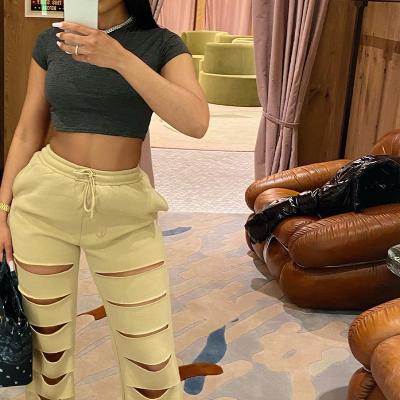 China Anti-pilling Factery 2022 Hot Selling Waist Casual Loose Ripped Sweatpants Tops For Women Wide Leg Hollow Out Trousers for sale