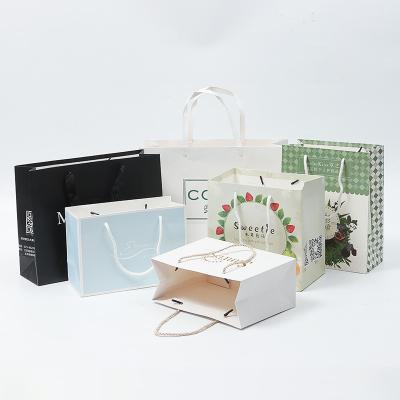 China Recyclable Custom Display With Logo Apparel Wig Food Shopping Gift Paper Bag for sale