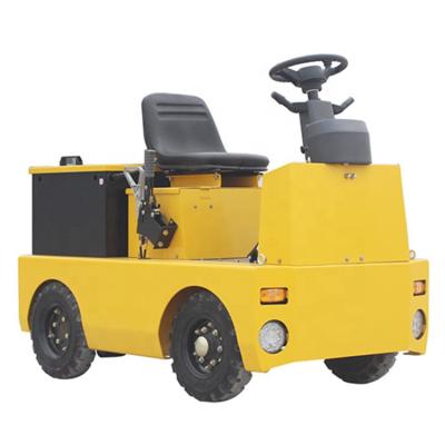 China Hotels 6000Kg High Quality 48V Tow Tractor Seat-Driving Electric Forklift Truck for sale