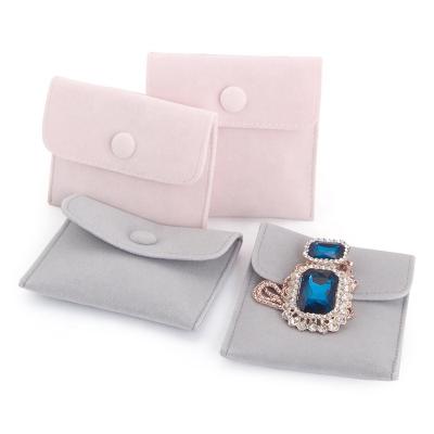 China Custom Logo Jewelry Bag Velvet Jewelry Packaging Pouches Packaging Bags With Button for sale