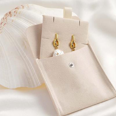 China Custom Jewelry Packaging Bag Pouch With Insert Button Custom Logo Jewelry Ring Earring Pouch for sale