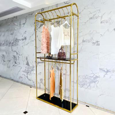 China Modern style/European style entrance lux fashion baby clothing store shelf customized clothes display rack for kids professional factory for sale