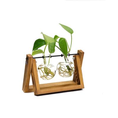 China New Classic/Postmodern Desktop Mini Glass Planter Bulb Vase Bulb Greenhouse with Retro Solid Wood Swivel Stand and Metal Stand for Hydroponics Plants for sale