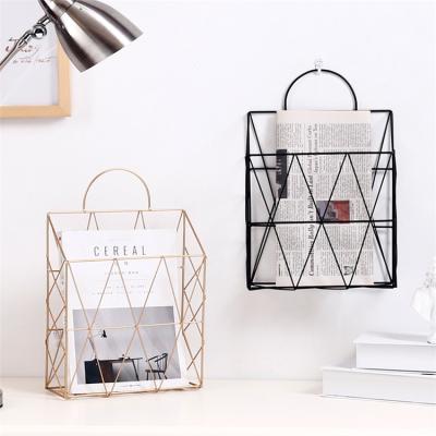 China Sustainable High Quality European Style Rose Gold Art Wall Mounted Metal Magazine Storage Basket for sale