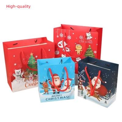 China Fancy Christmas Party Favor Craft Recyclable Custom Shiny Embossed Embossed Shopping Paper Bags Small With Tissue Paper Card For Wedding Birthday for sale