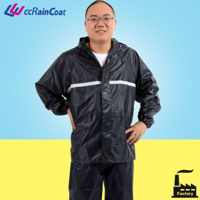 China Polyester adult waterproof raincoats with reflective branding on the front and back for sale