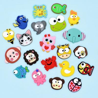 China Plastic PVC Custom Design Cartoon Kids Brooches Stock Kids Pins Light Soft PVC Animals Souvenir Promotional Gifts for sale