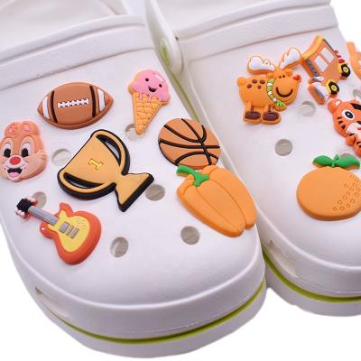 China Clog Charm Stock PVC Rubber Shoe Charms Buckles Accessories Decorations For Clog Shoes for sale