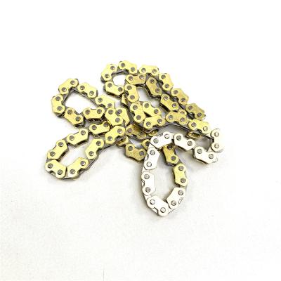 China Good Selling Csrk Stainless Steel Motorcycle Parts Reinforced Copper Clad Motorcycle Chain for sale