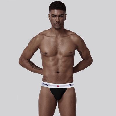 China Anti-Static Mens Cotton Solid Color Sexy Breathable Underwear Jockstrap With Hollowed Out Back Jockstraps for sale