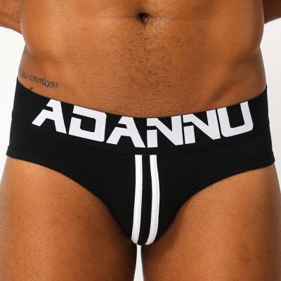 China Trend fashion youth thong men solid color anti-static low rise underwear sexy and charming for sale