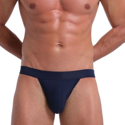 China Anti-static men's crossover underwear with butt lifting, men's sexy solid color, cool and fun thong for sale