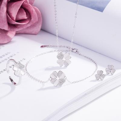 China Fashion OEM CLASSIC Silver Necklace 925 Female Necklace Star Stud Earrings Set Jewelry Four Leaf Clover Shaped for sale